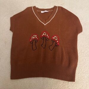 Lisa says Gah cute mushroom vest